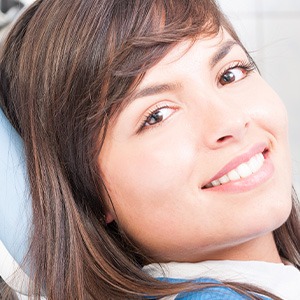 Close-up of female patient in dental chair