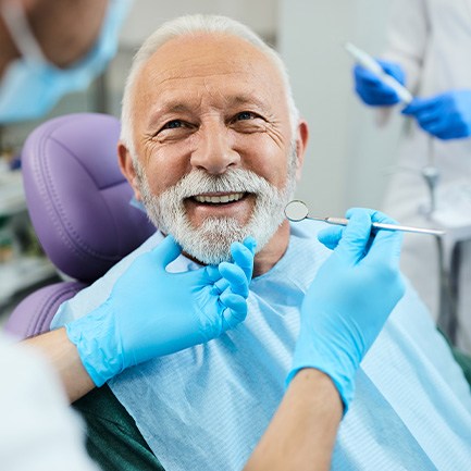 Man smiling in the dental chair